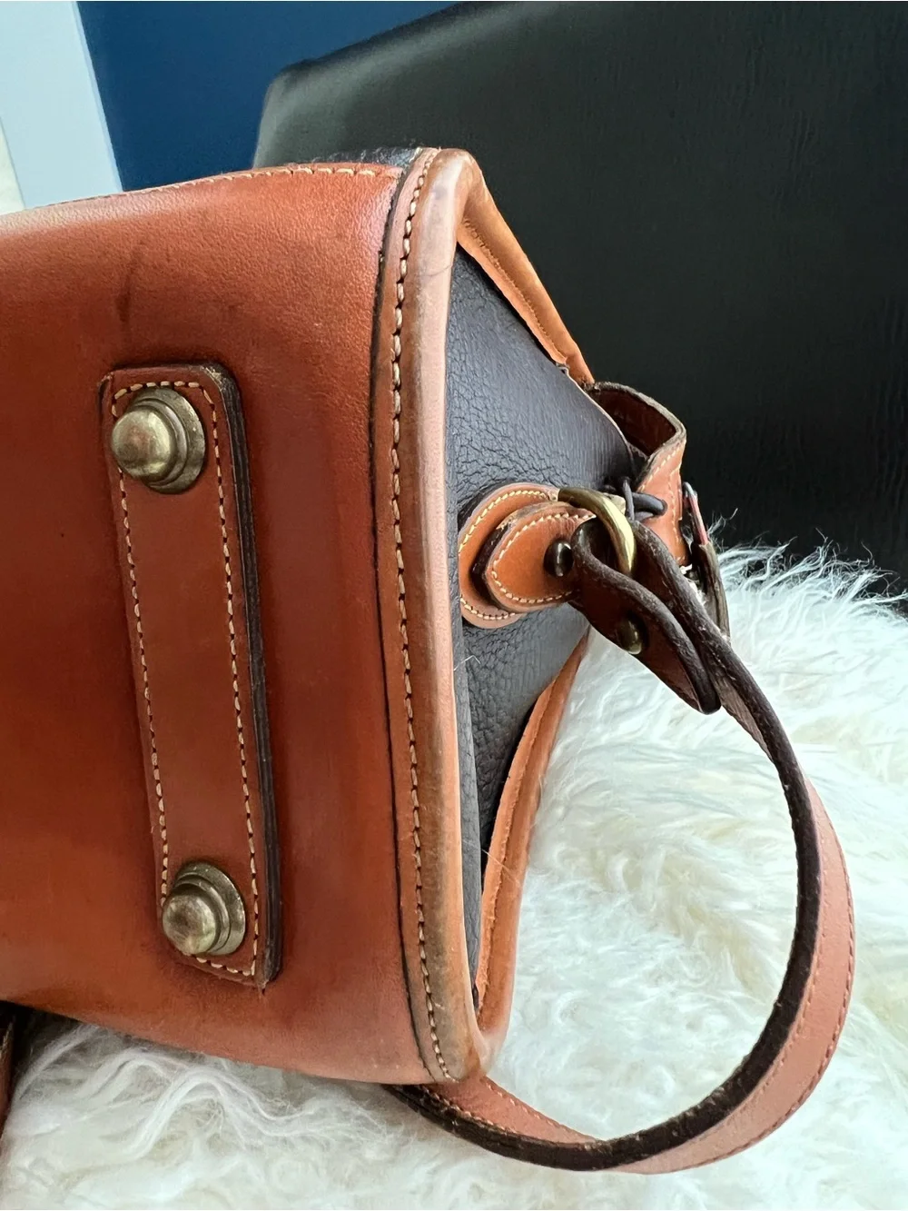 Dooney & Bourke VINTAGE black pebbled Leather satchel with British tan trim.